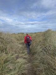 The path follows the dunes for some distance